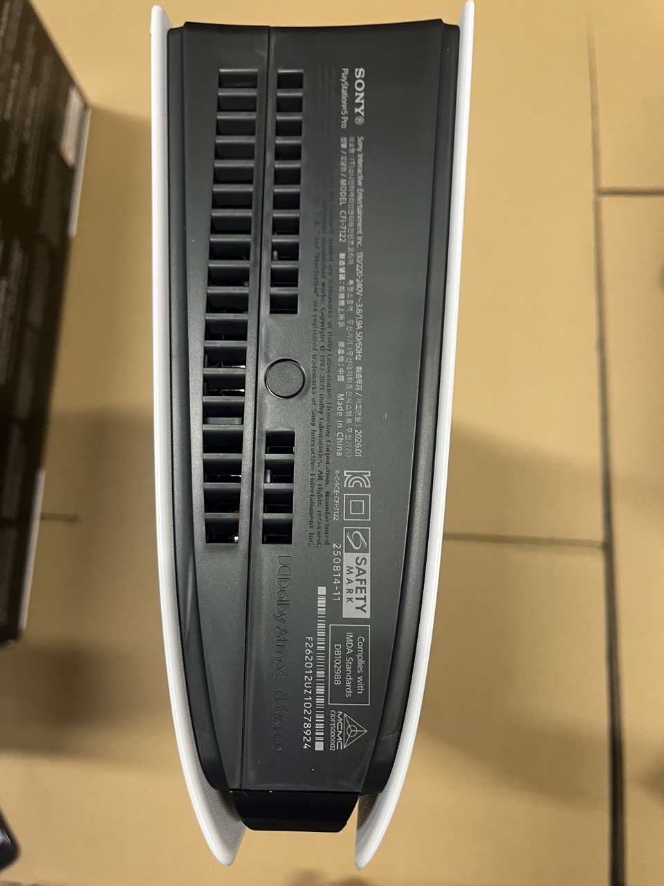 Identification label and ventilation detail on a Sony PlayStation 5 Pro console